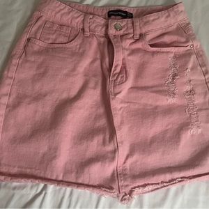 Pretty little Things pink distressed jean skirt